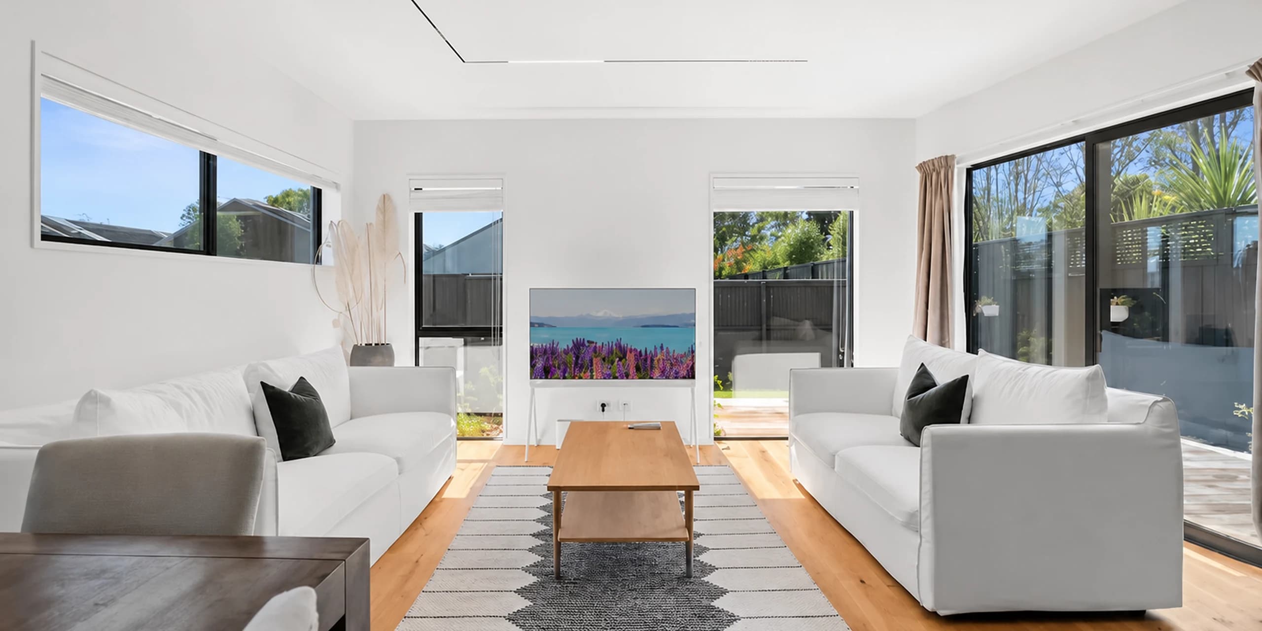 Bright family living room in a real Christchurch home